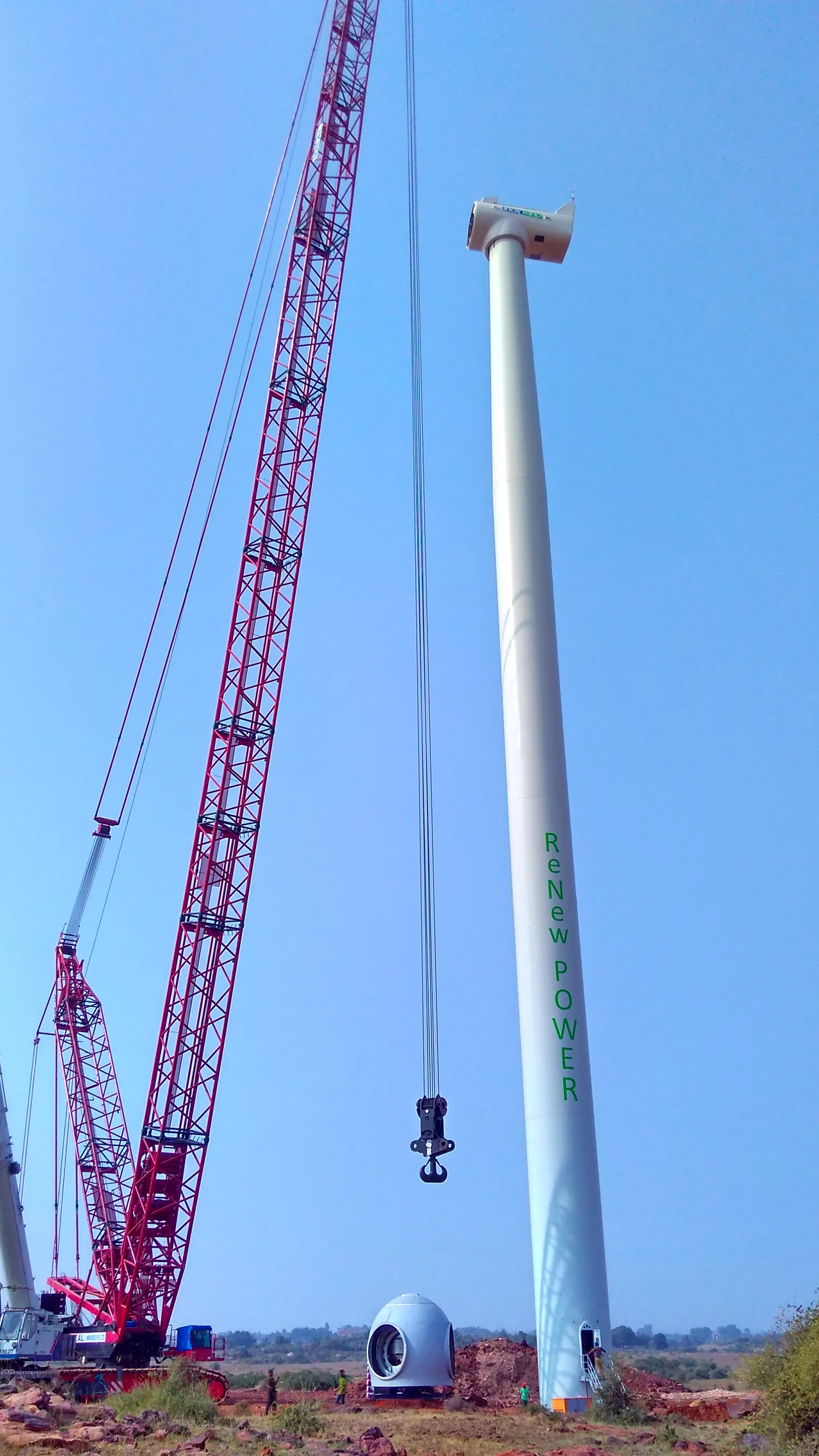Wind turbine erection activity with crane